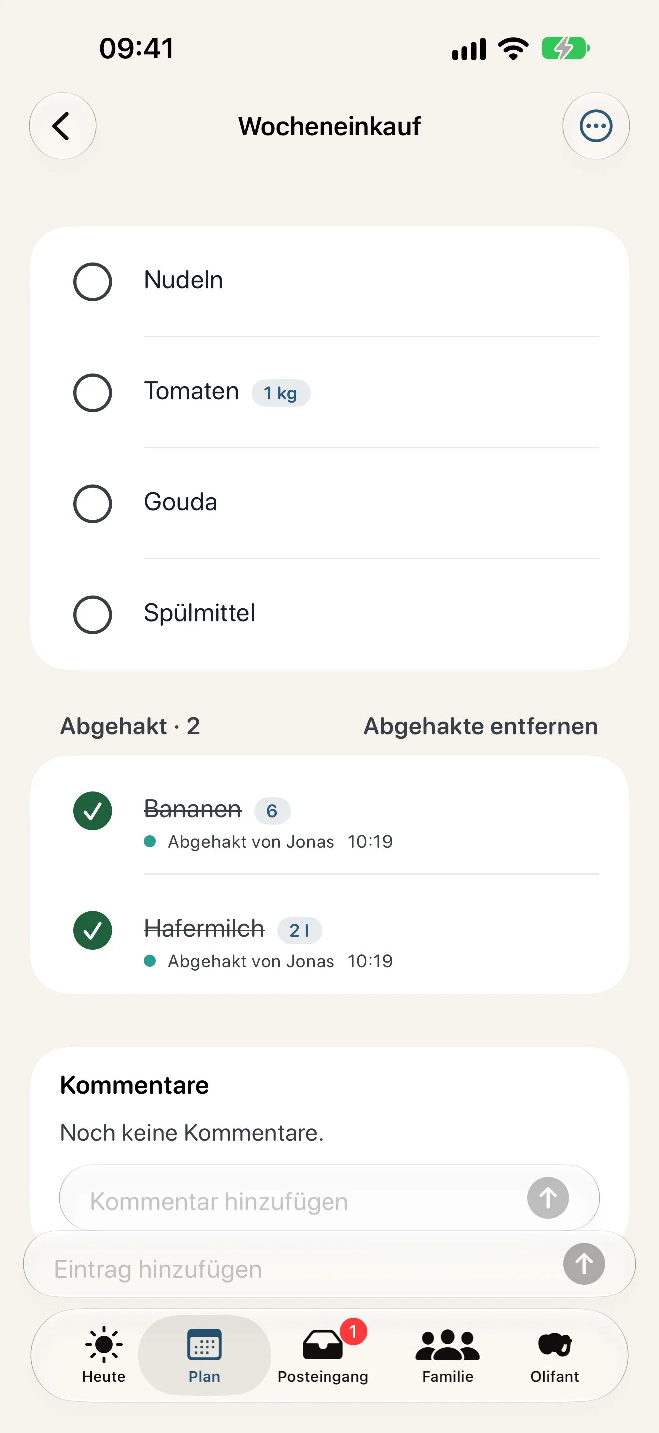 Eine gemeinsame Einkaufsliste in Olifant mit zwei abgehakten Einträgen
