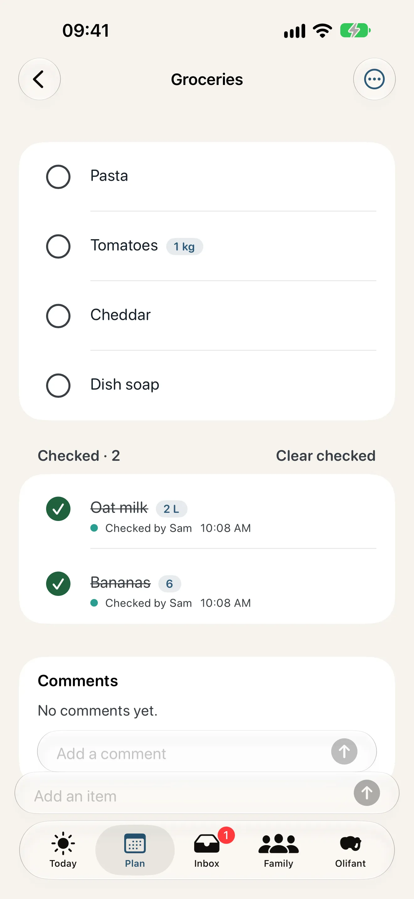 A shared grocery list in Olifant with two items checked off by Sam